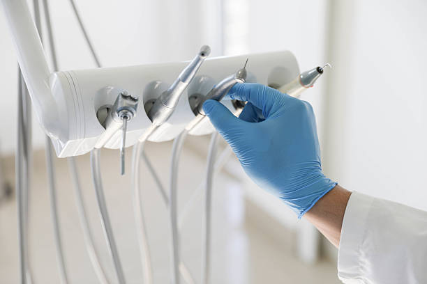 Professional Tooth Extraction technician working in Athens, MI